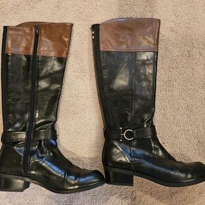 Black and brown riding boots